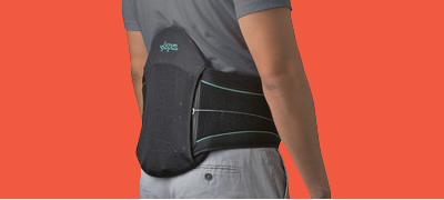 Person wearing a back support brace.